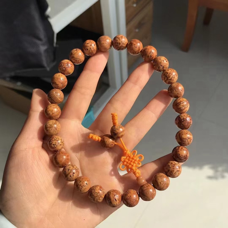 尼泊尔三角大龙眼菩提光珠28颗手持(货号120)-阿里巴巴