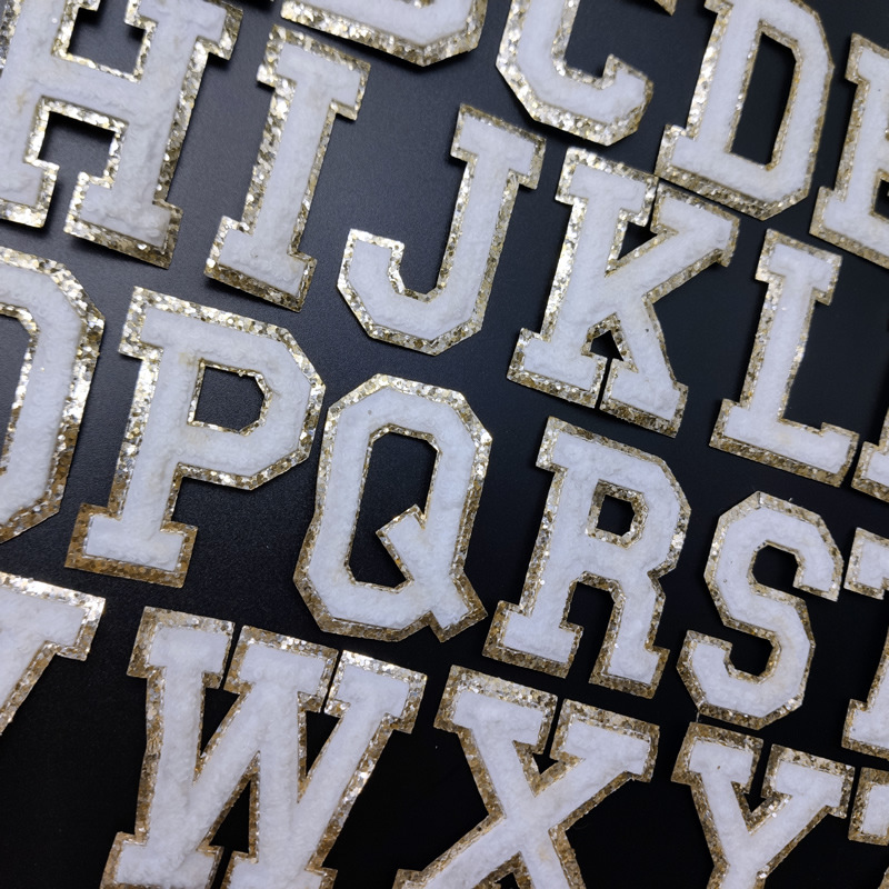 毛巾绣金底字母刺绣布贴英文补丁贴电脑绣花标衣服章仔亮片绣背胶