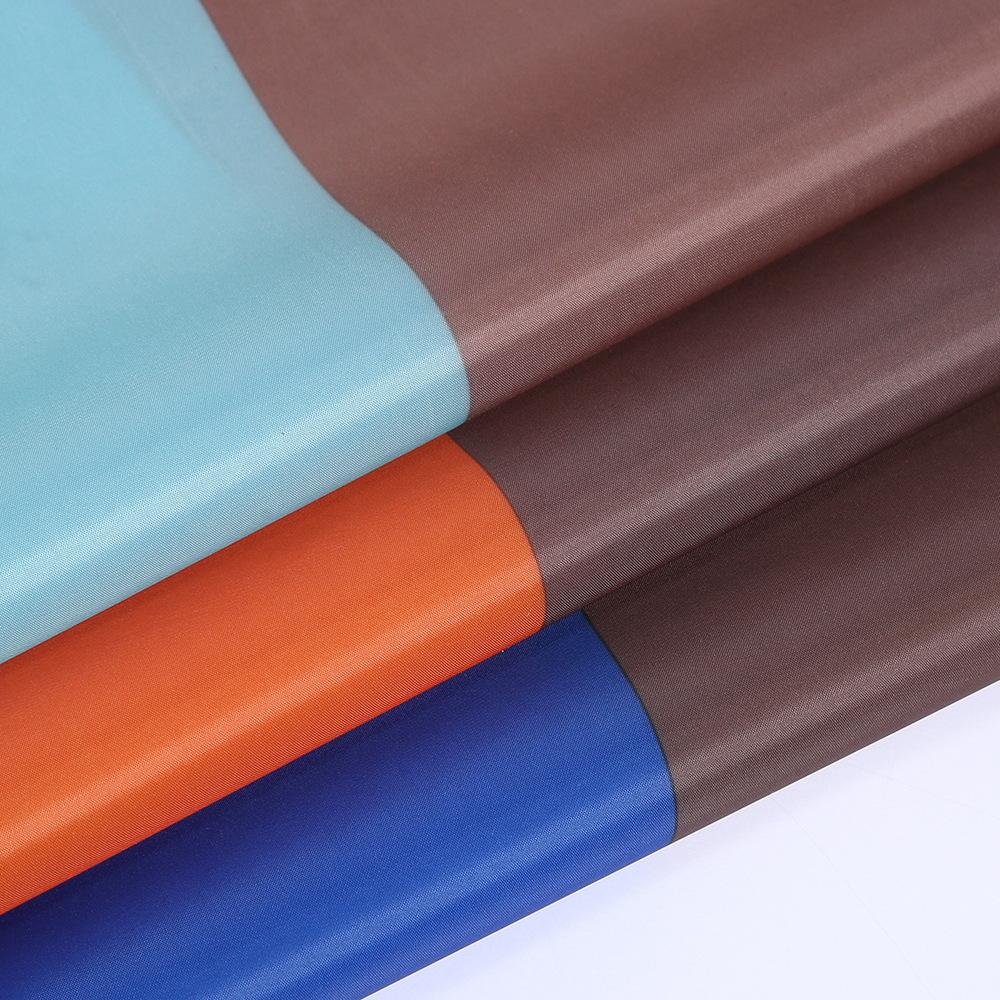 210d涤塔夫pvc防水布料箱包布帐篷野餐垫面料 雨衣套袖围裙服装布