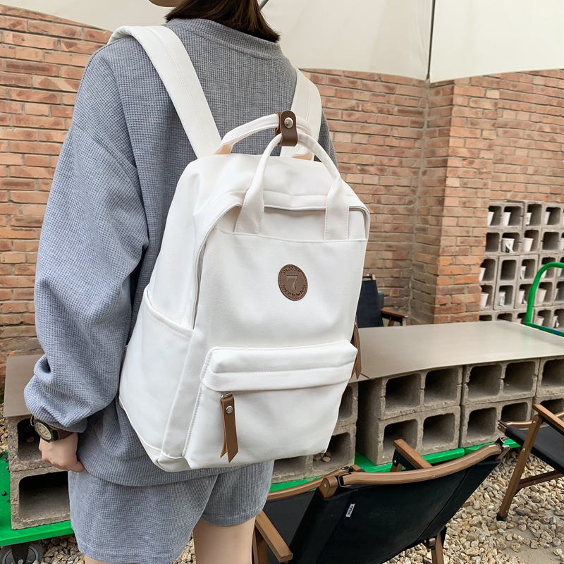 帆布双肩包女秋季新款休闲旅行手提包韩版简约质感初高大学生书包