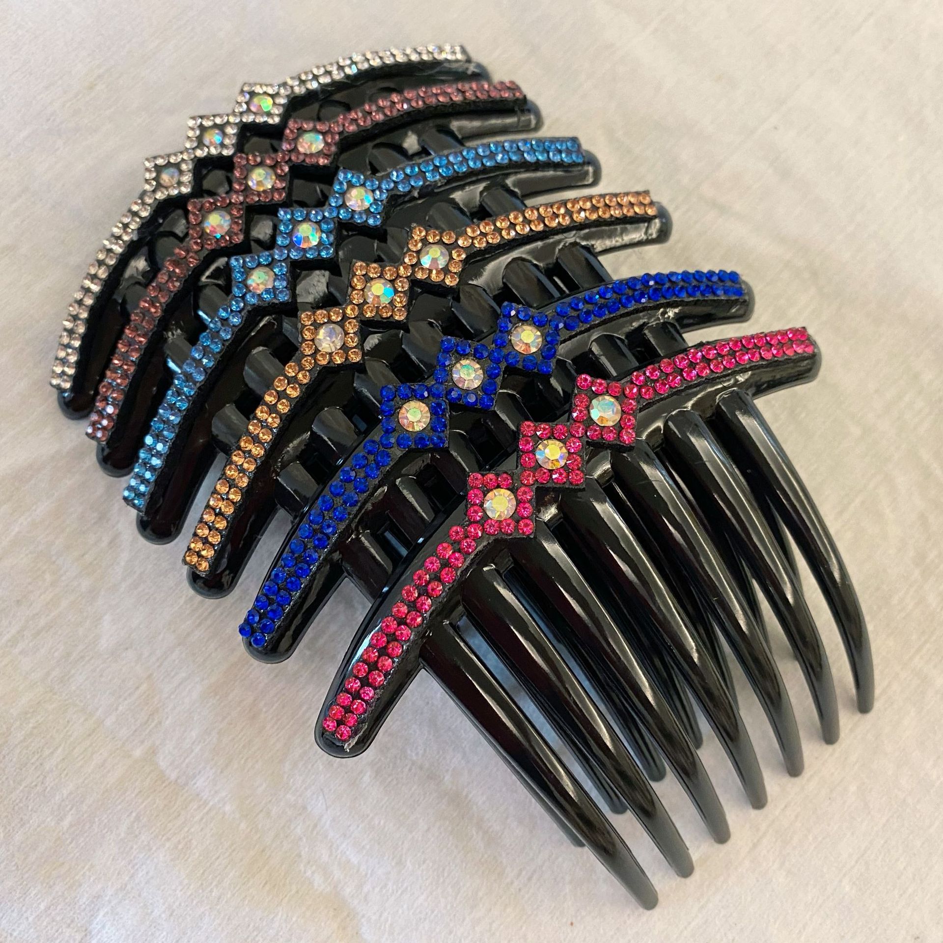 9成交602个相似新款成人丸子头盘发神器优雅发饰水晶串珠七齿发梳插梳