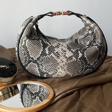 HN5004-1春真皮皮包绵羊皮蛇纹印花金属扣高级手挎女士轻奢手拿包