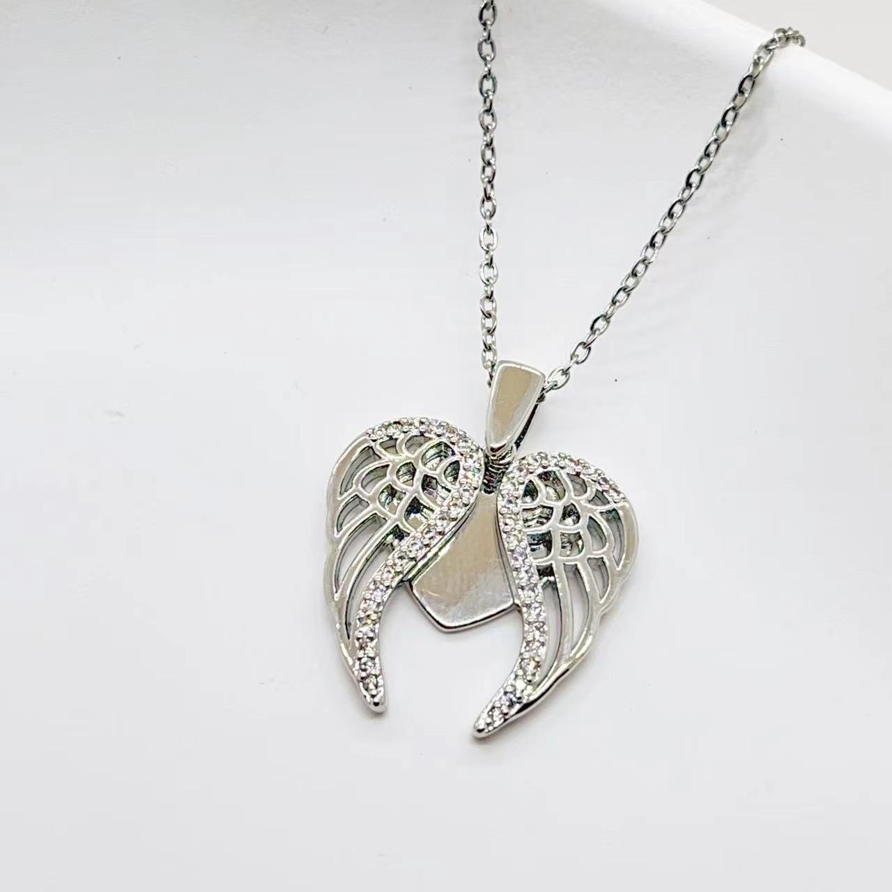 Cross-Border New Arrival Peach Heart Bow Copper Zircon Micro-Inlaid Heart Wings Open Titanium Steel Necklace Clavicle Chain Female