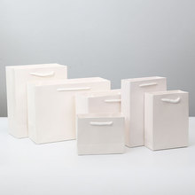 厂家制造白卡纸袋礼品袋服装纸袋黄白牛皮纸袋各种公司宣传手提袋