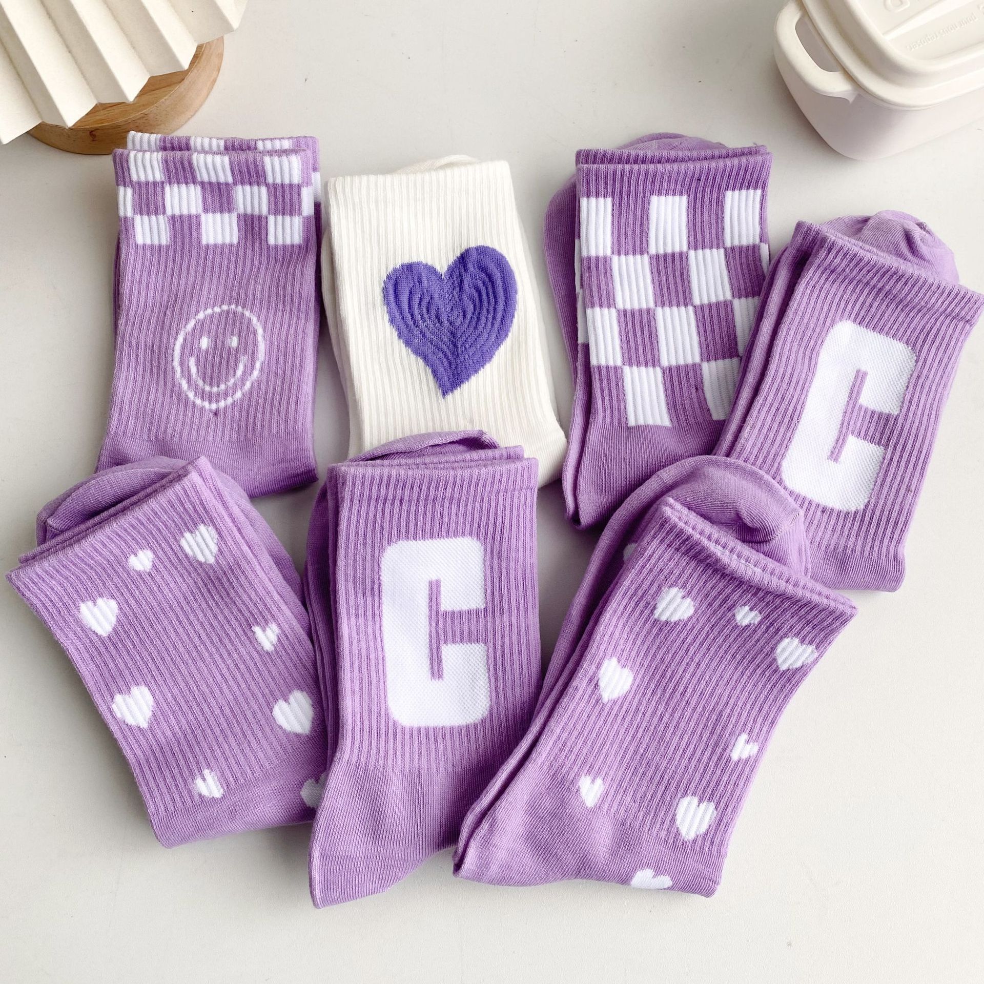 袜子女春秋中筒ins潮女袜紫色运动女士长袜诸暨袜子批发 足巴巴