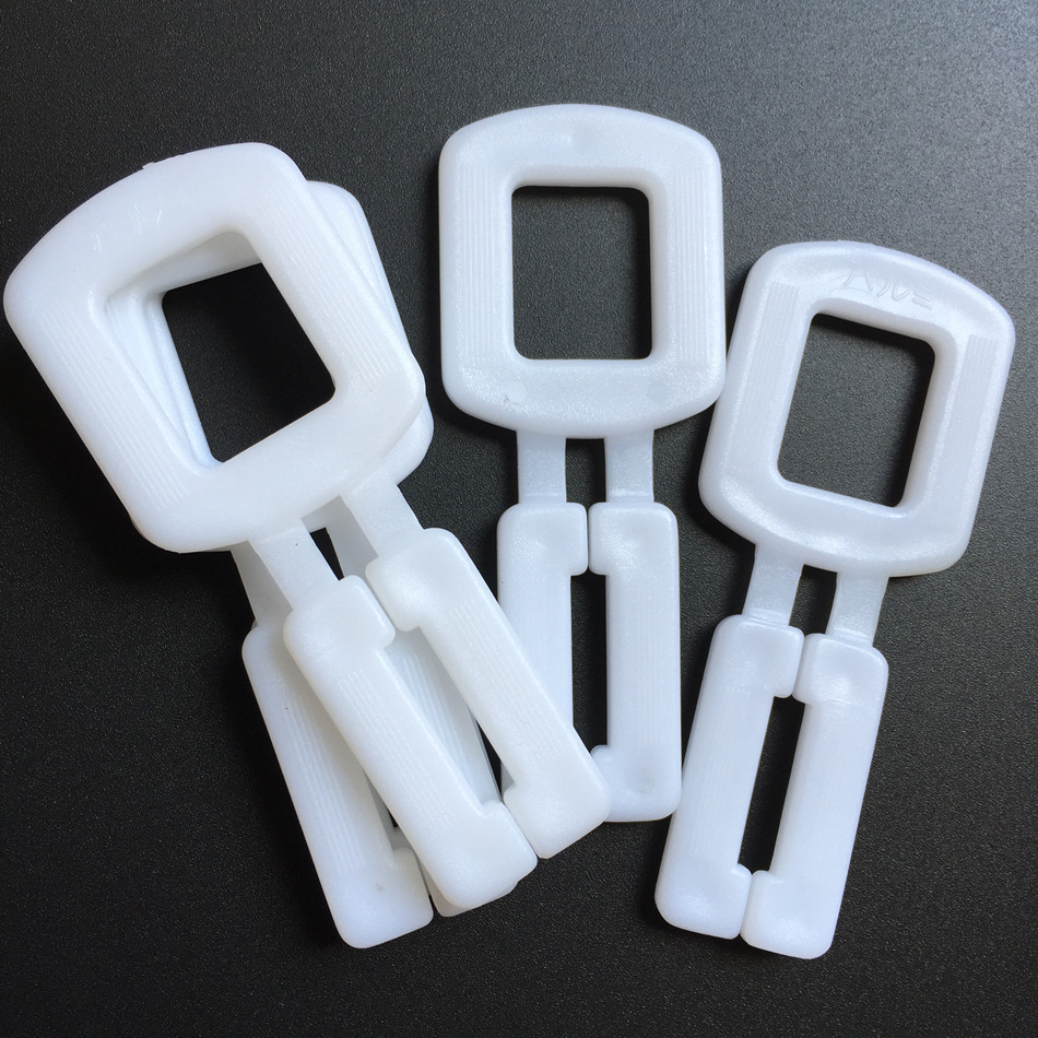 pp打包扣新料透明塑料扣乳白塑料拉扣人字扣纸箱打包 塑料打包扣