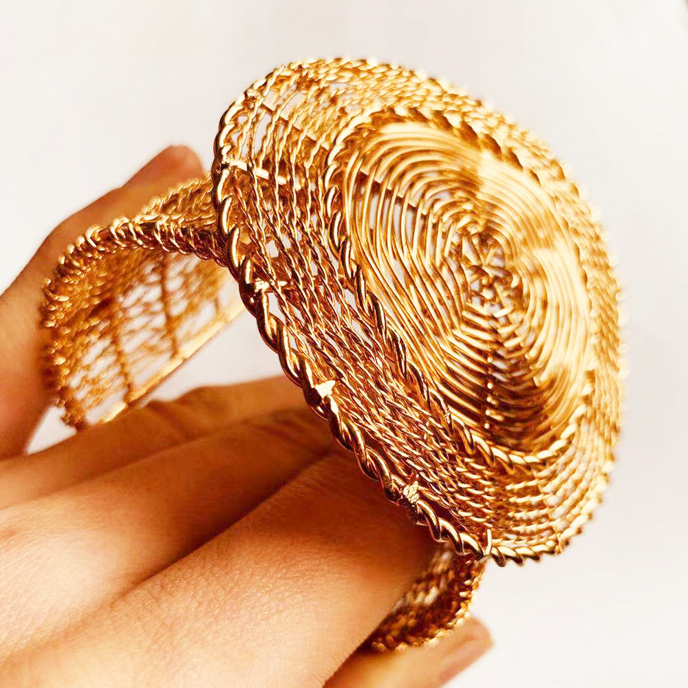 来样来图定制各种铁铜合金手饰品铁丝编制纯人工网面格孔镂空手镯