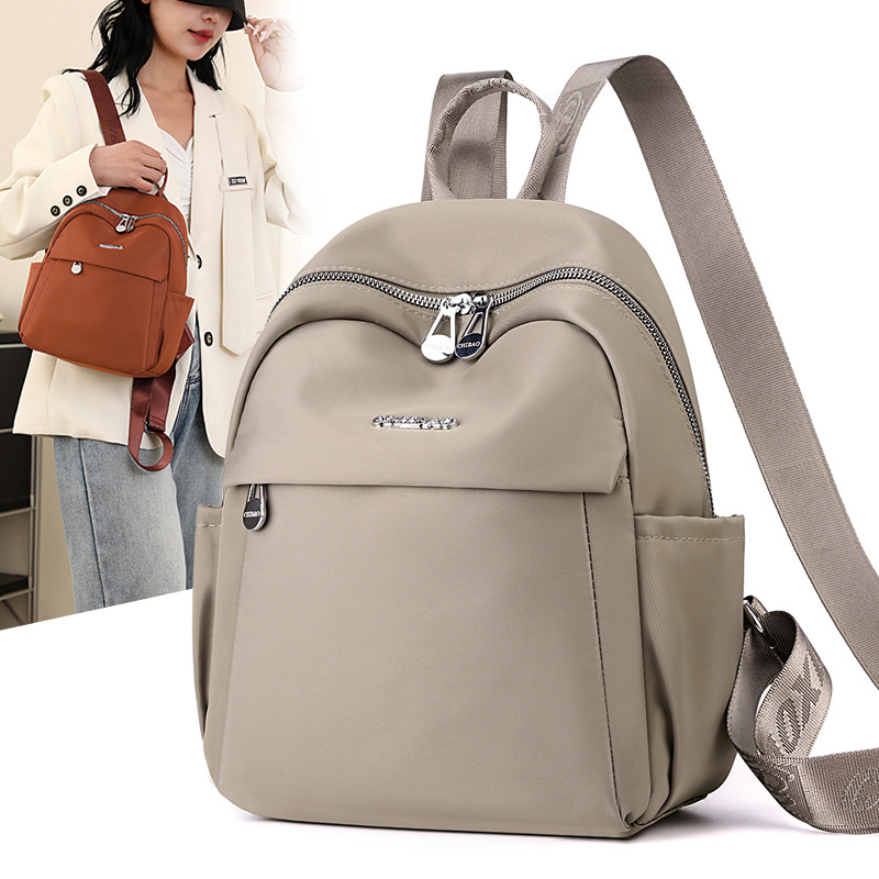 现货工厂2024新款时尚轻便大容量双肩包休闲防水尼龙布包女士背包