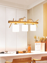 日式原木实木创意玻璃小鸟餐厅吊灯三头简约现代餐桌led北欧灯具