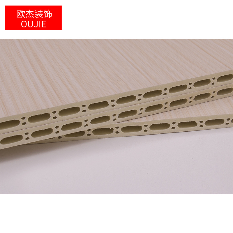 600宽9厚梅花孔竹木纤维集成墙板木塑护墙板墙裙酒店装修室内材料