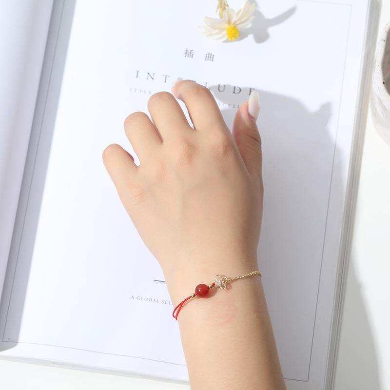 中国结水晶转运招桃花本命年红绳手链女小众学生简约设计感手饰