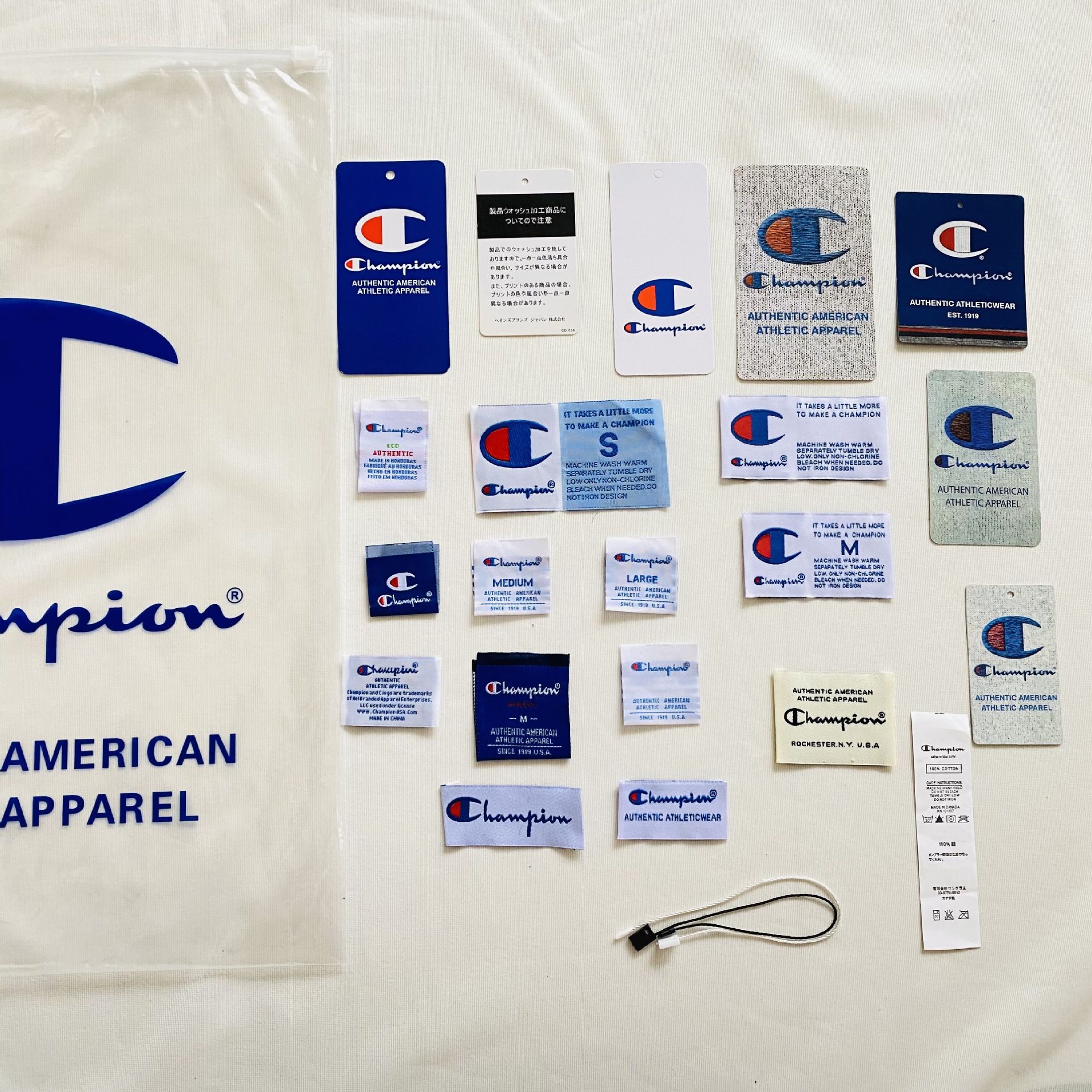 champio冠军吊牌防伪扣尺码表水洗领标织标布标衣服包装服装辅