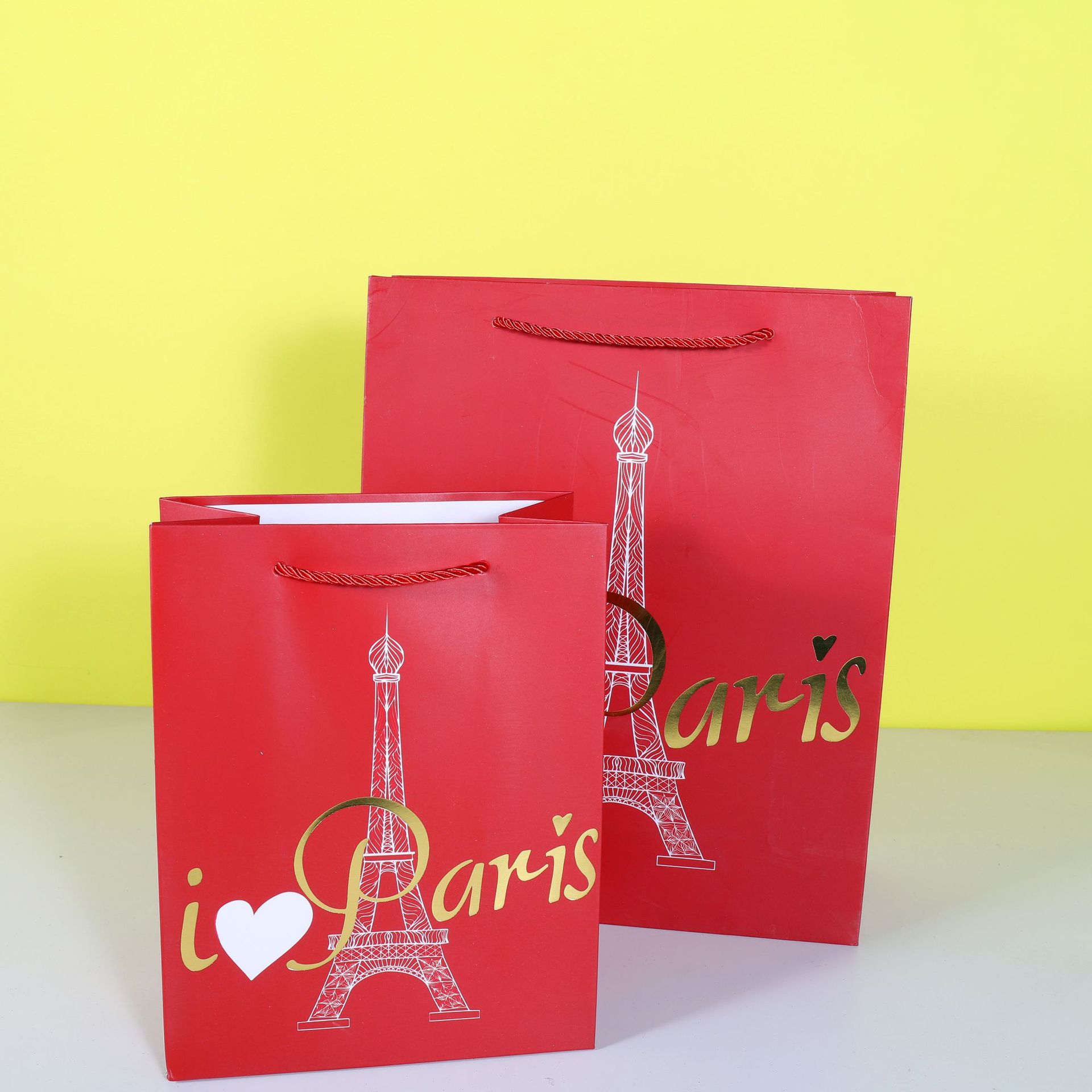 Yiwu Paper Bag Factory Paper Shopping Bag Love Gift Bag in Stock Wholesale Eiffel Tower Series
