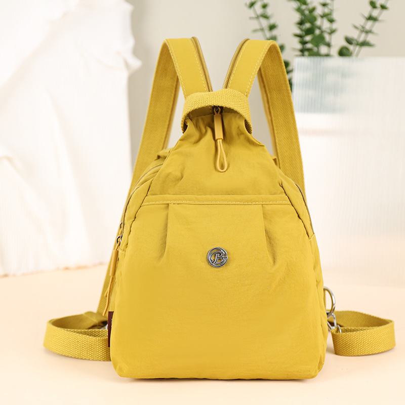 双肩包女帆布包多功能小型旅行背包简约时尚牛津布斜挎通勤小胸包