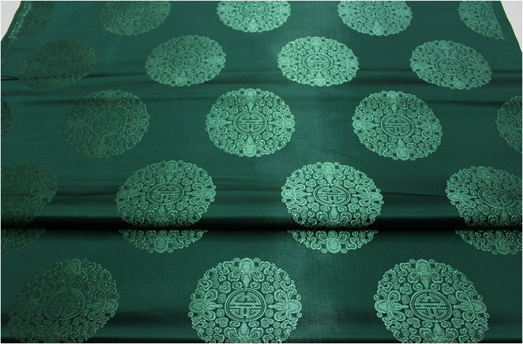 中国风唐装蒙古袍影视装饰坐垫抱枕布料提花织锦缎丝绸团花面料