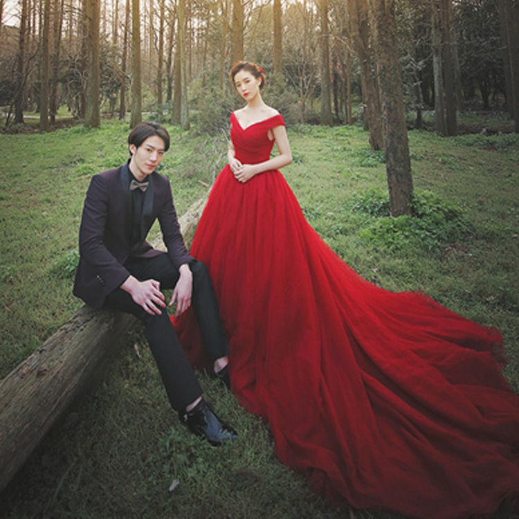 影楼婚纱照主题摄影情侣写真拍照服装 外景旅拍红色婚纱深v长拖尾