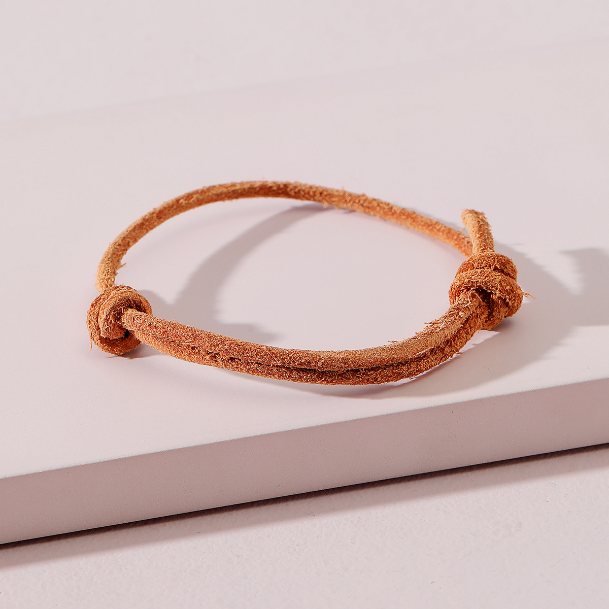 青岛黛薇欧美时尚饰品牛皮绳打结抽拉手链