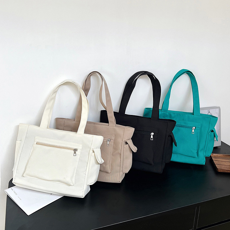 大学生上课通勤大容量手提布袋大包包女2023新款帆布包单肩托特包