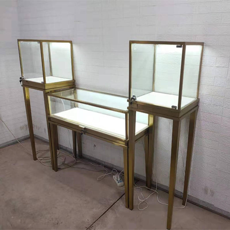 厂家供应饰品展示柜 定做珠宝展柜钢化玻璃镀钛不锈钢首饰柜定制