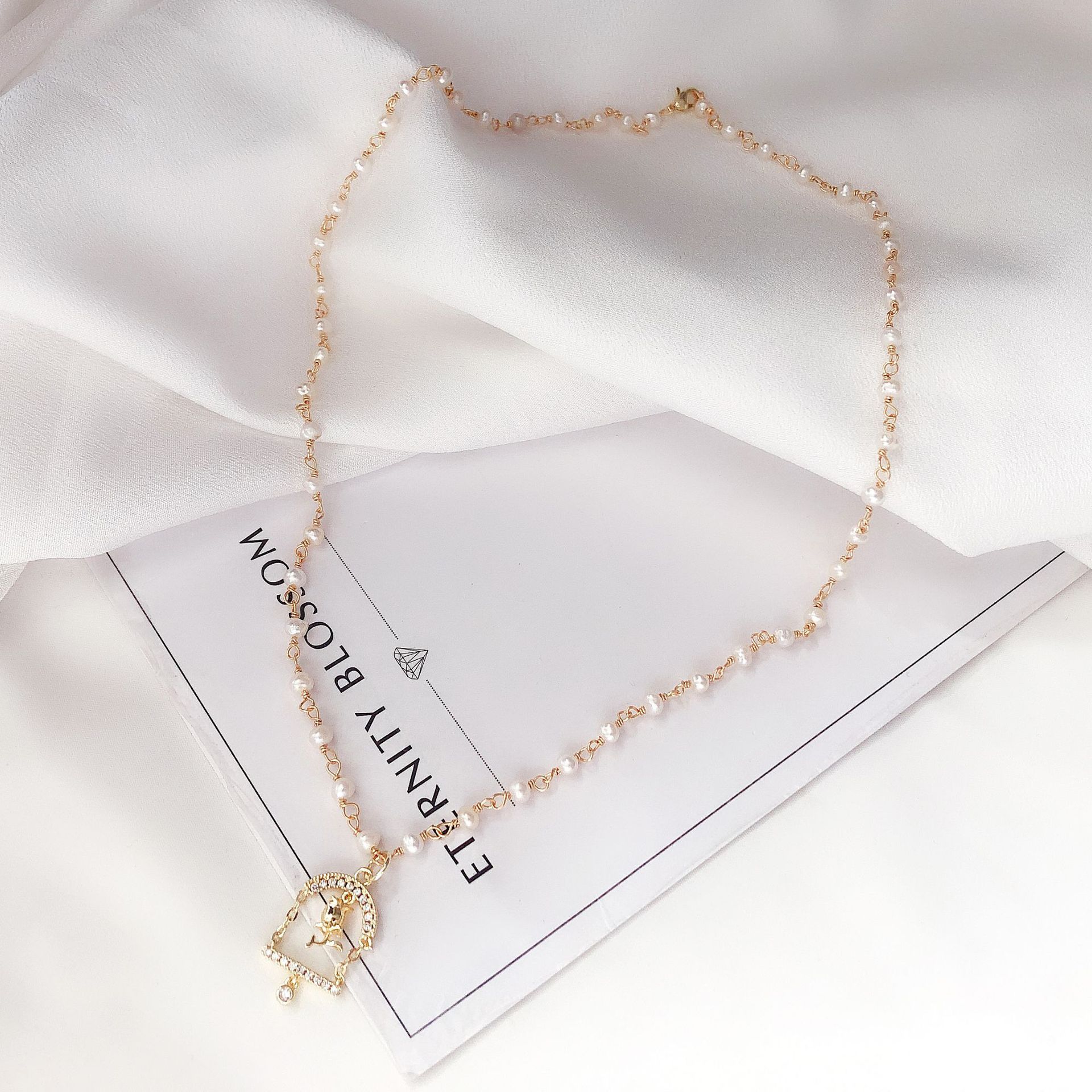 个性时尚珍珠毛衣链 韩版轻奢玫瑰吊坠气质长款项链工厂批发