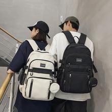 百搭短途旅行背包女新款大容量双肩包男生行李包大学生高中生书包