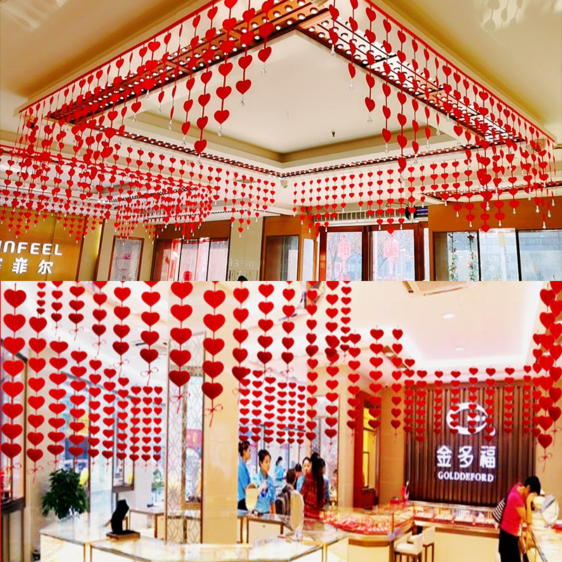 珠宝店吊顶装饰布置国庆中秋节手机店铺氛围爱心吊坠金店布置创意