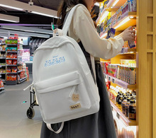 新款韩版学生双肩包女刺绣小清新初中高中生书包纯色帆布旅行背包
