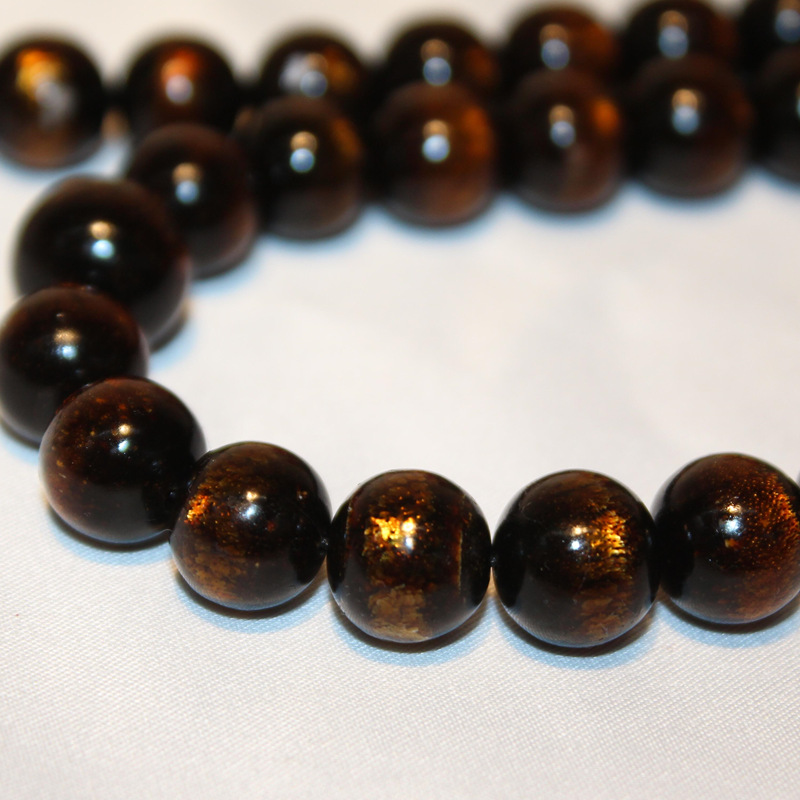 材质:金丝海柳(又名:海底铁树 印尼产地又称:黑颜色珊瑚) 形状:项饰