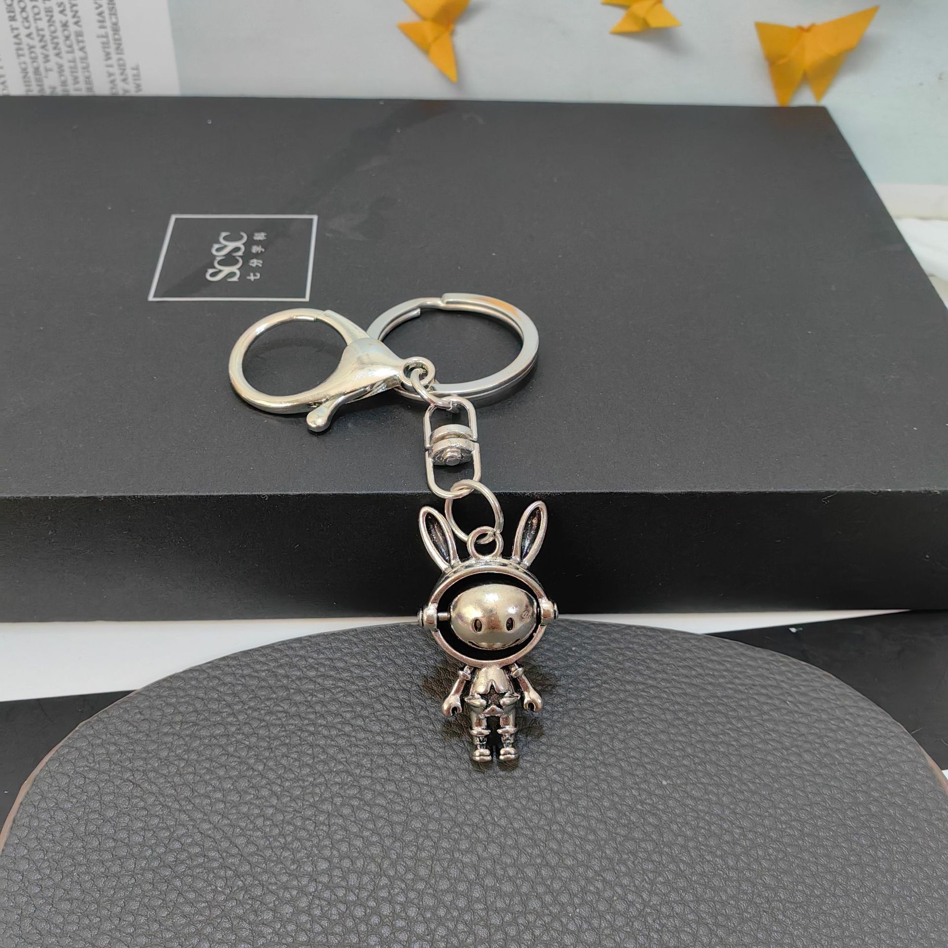 Cross-Border Rotating Space Zodiac Rabbit Switch Crying Face Smiley Face Keychain Pendant Astronaut Key Chain Bag Ornaments