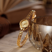 时空回廊新款简约轻奢石英表迷你圆形小金表气质钢带休闲女士手表