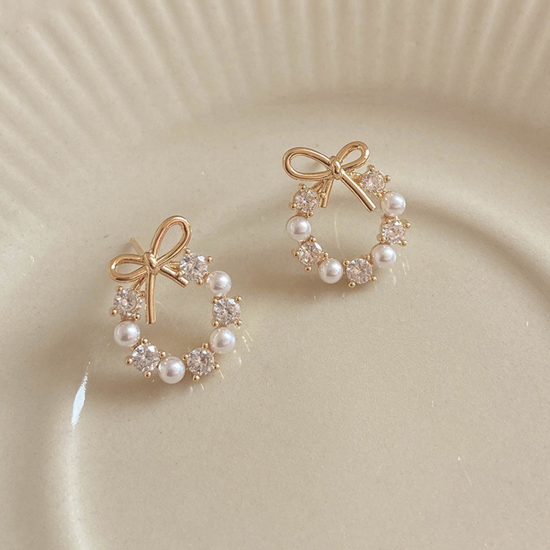 小巧珍珠蝴蝶结耳钉女2021年新款圆圈水钻耳环高级感气质网红耳饰