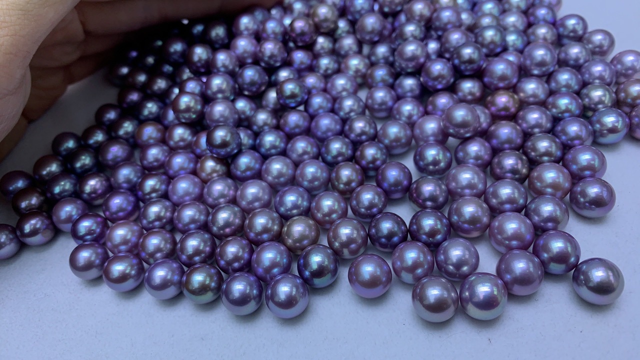 天然紫色爱迪生珍珠正圆孔后微微瑕或微微生长纹11-12mm裸珠批发