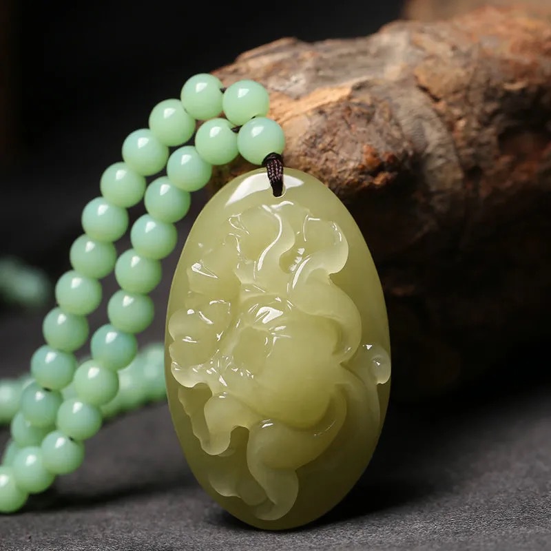 厂家批发新疆和田玉青白玉荷花吊坠蚕丝玉玉石挂件男女毛衣链