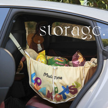 短绒车载椅背置物袋便携手提布袋车后排座挂袋零食杂物车载束口袋