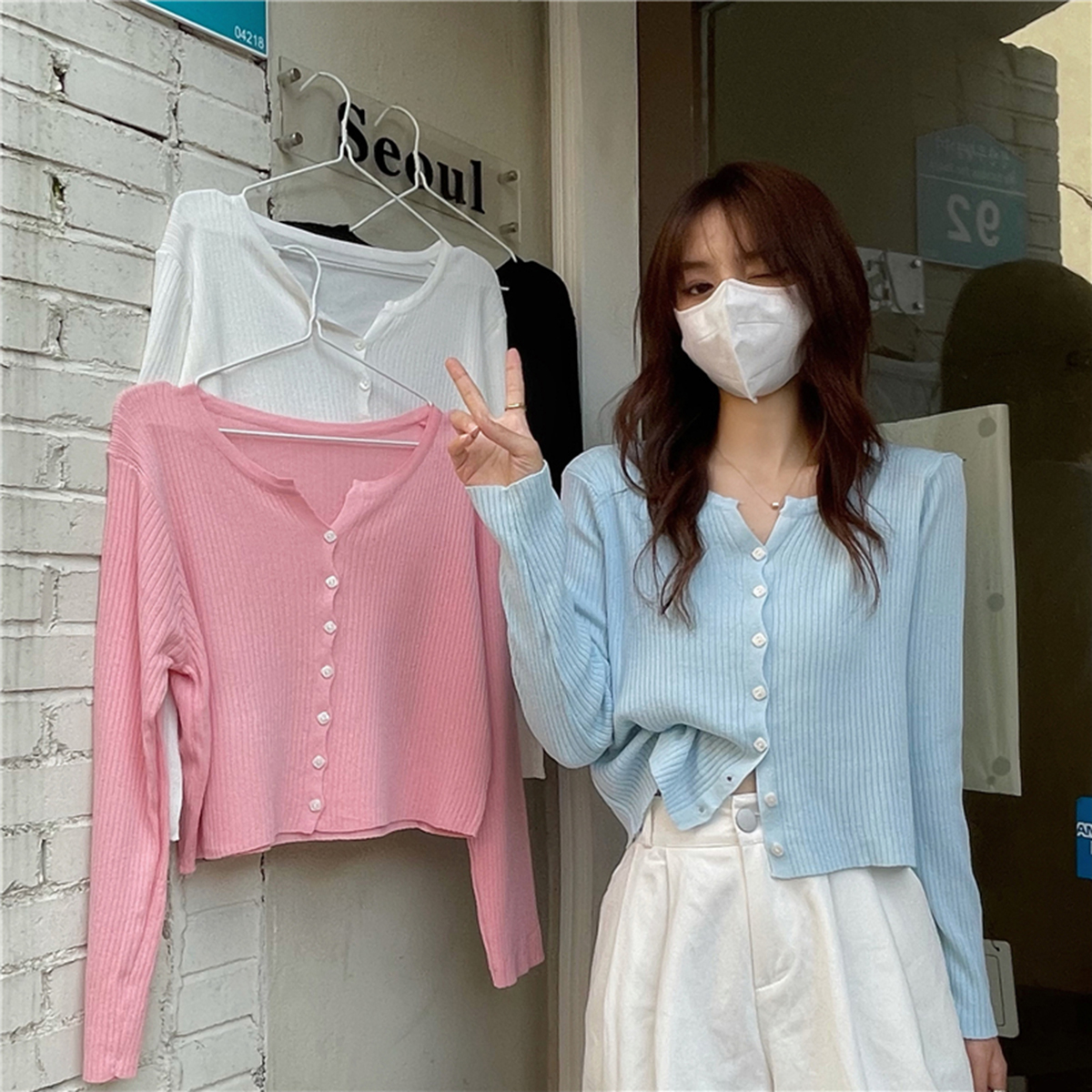 白色温柔风外搭薄款2024夏季韩版新款长袖防晒针织开衫外套上申路