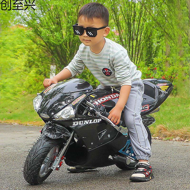 新款迷你小型摩托车二冲汽油迷你彩灯小跑车电动儿童车成人趴车