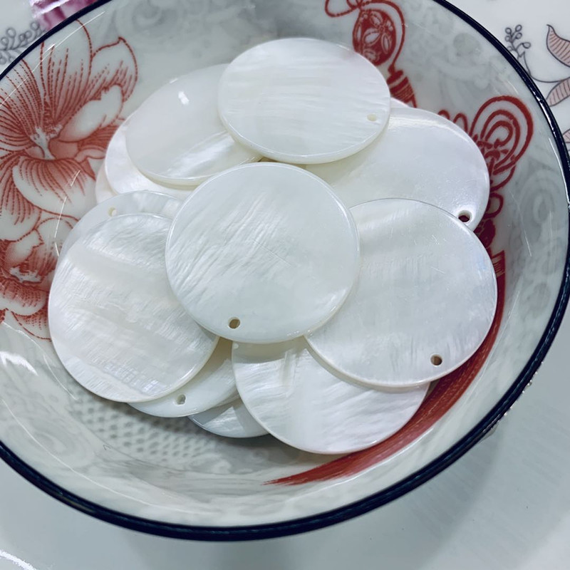 贝壳圆片diy配件珍母贝圆形边孔片耳饰发饰贝壳圆片大量批发