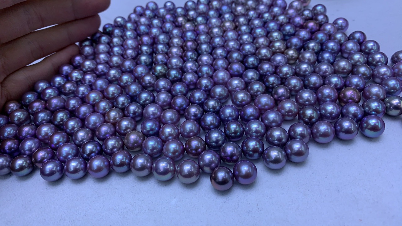天然紫色爱迪生珍珠正圆孔后微微瑕或微微生长纹11-12mm裸珠批发