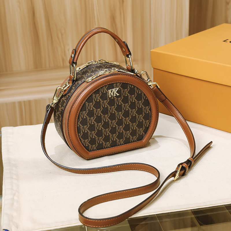 香港名牌m小k圆形包包女2021新款时尚百搭单肩斜挎饼包手提包2