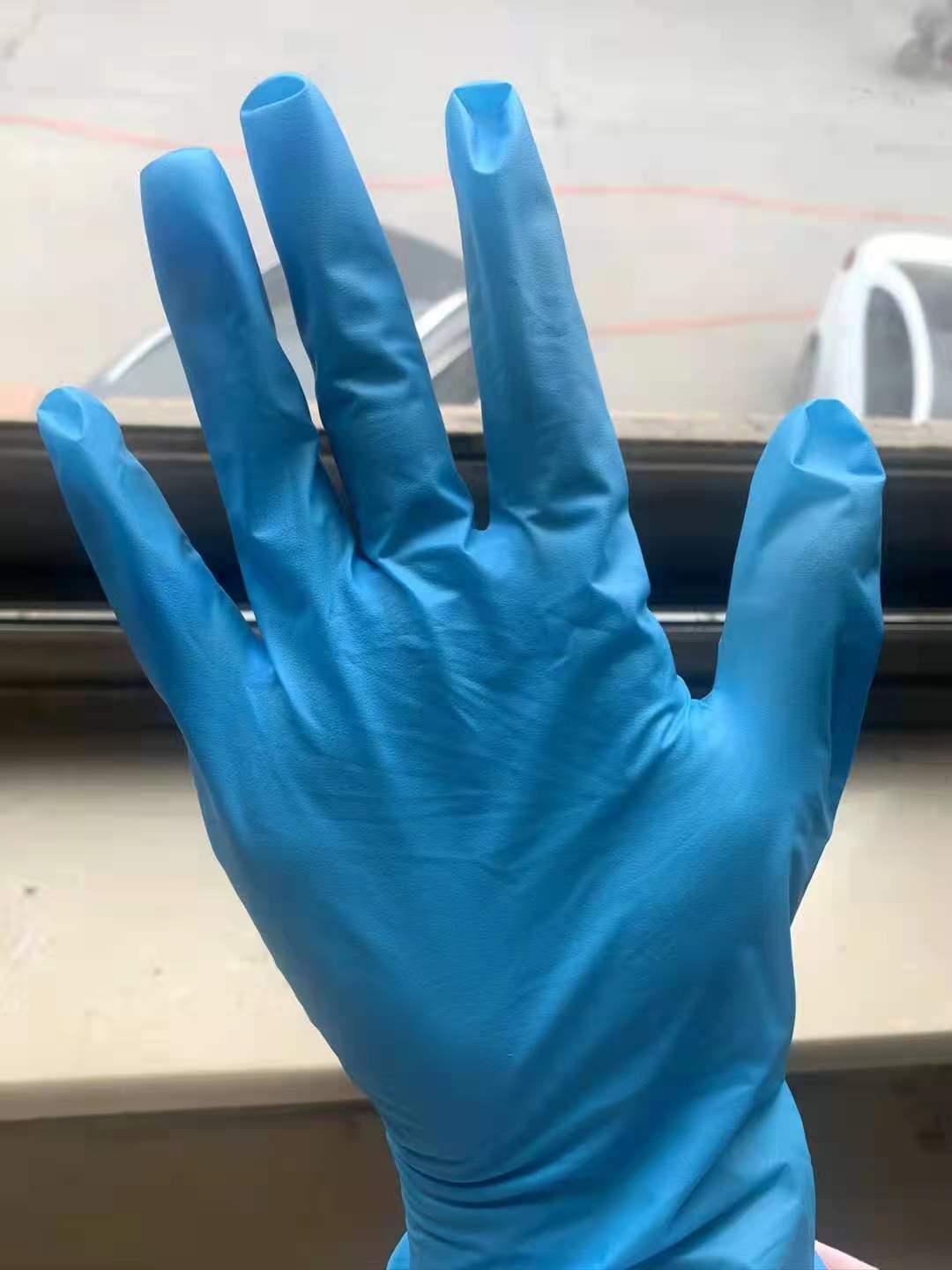 万力蓝色丁腈改性合成pvc防护手套高弹餐饮食品英文黑色100支无粉