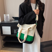 新款韩版大容量手提包时尚定型斜挎单肩包小众拼接帆布水桶包女包