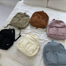 韩版新款双肩包多口袋纯色通勤书包百搭休闲大容量旅行背包尼龙袋