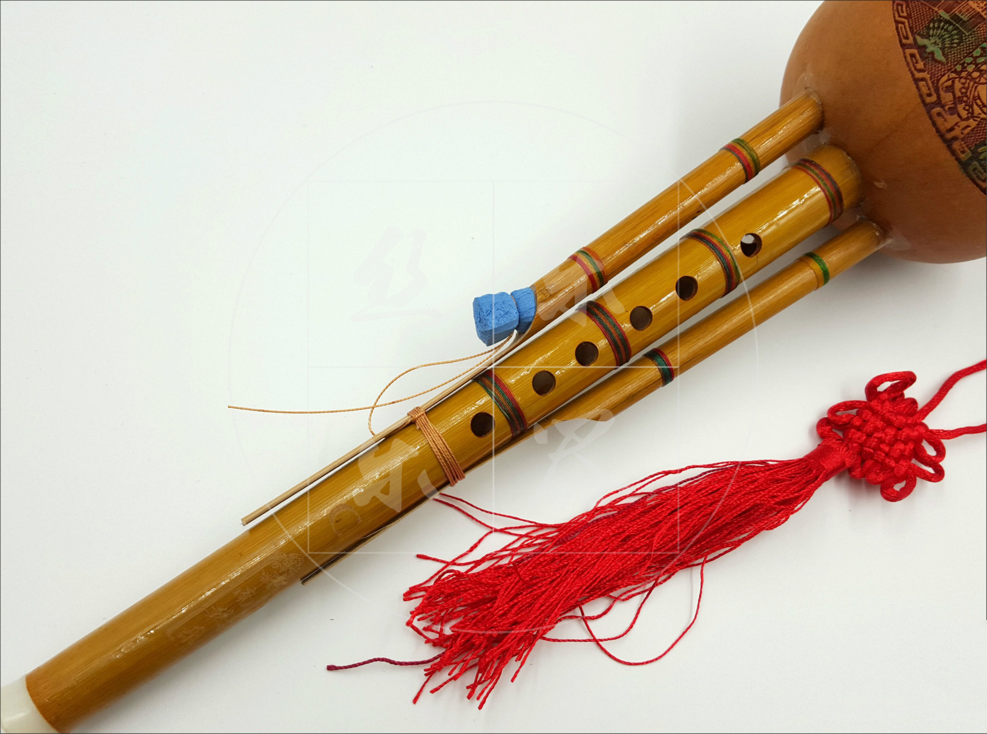 厂价直销:天然凤尾竹绑七彩线 初学双音葫芦丝降b调 c调乐器批发