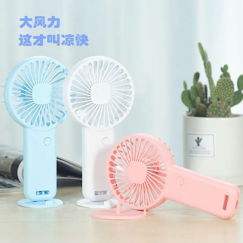 2023 Handheld Mini Little Fan Portable USB Charging Portable Mute Office Desk Surface Panel Electric Fan Fixed Logo