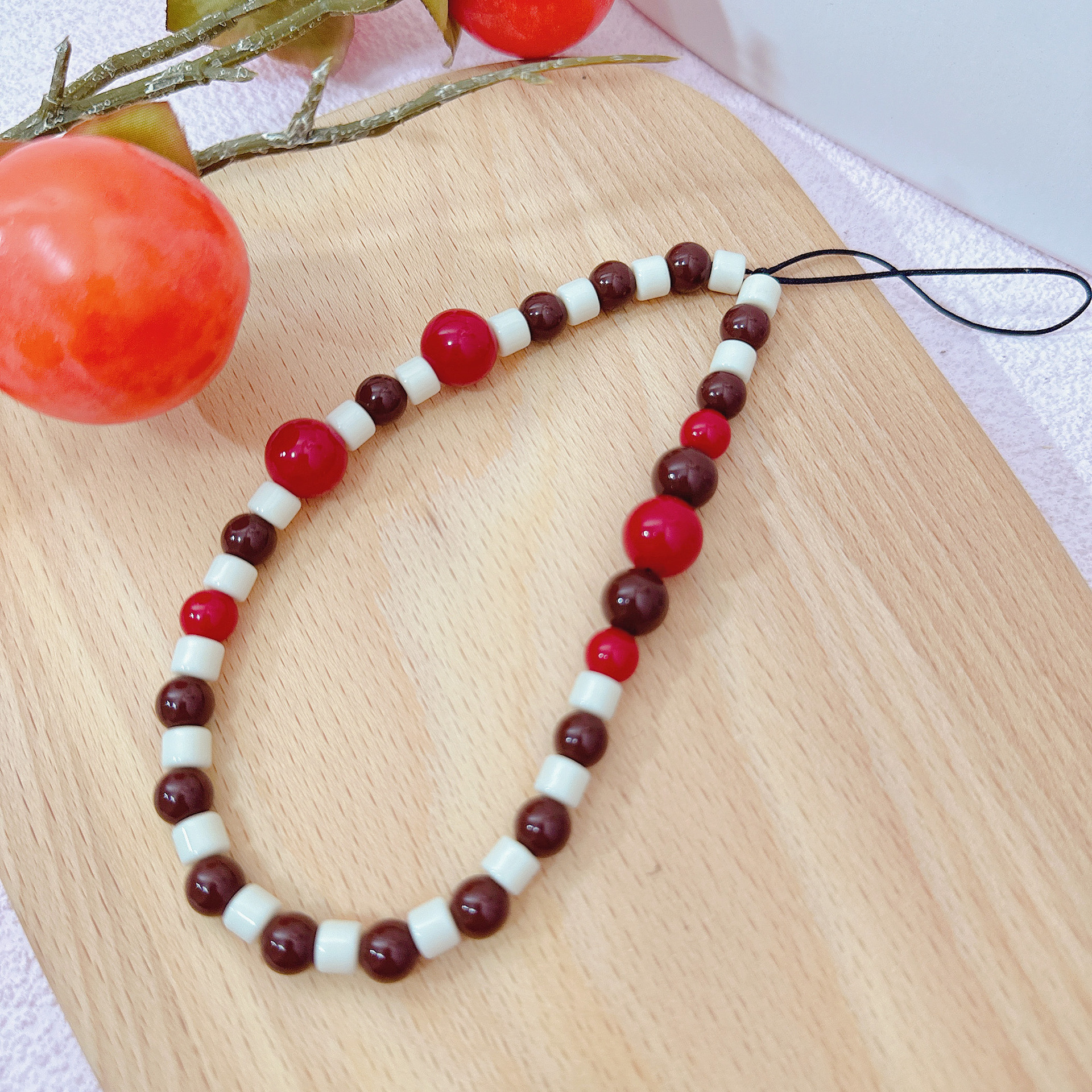 欧美风红豆巧克力手机壳挂绳清新甜美串珠手机链防丢包包钥匙挂件