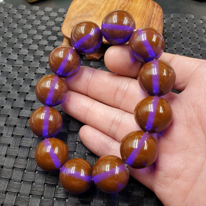 爆款蓝精灵手链 佛珠波罗的海蜜蜡二代老蜡手串变色手持打光变色