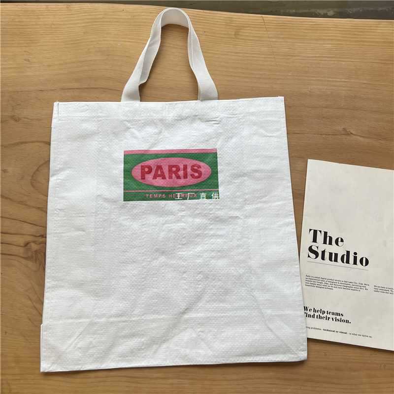 白色巴黎英文字母防水编织袋大容量简约手提袋购物袋单肩袋-阿里巴巴