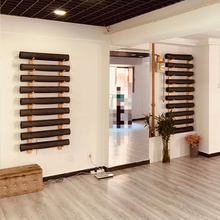 实木瑜伽垫收纳架健身房上墙壁挂架子木质幼儿园地毯架教具置物架
