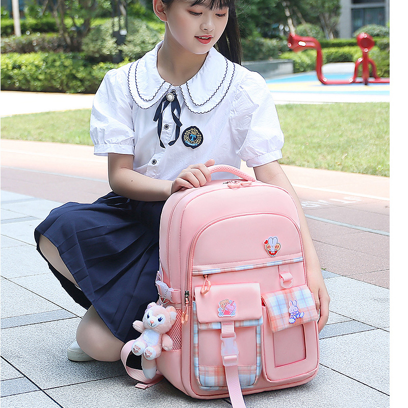 网红新款小学生书包女童双肩包减负护脊包女学生轻便双肩儿童背包