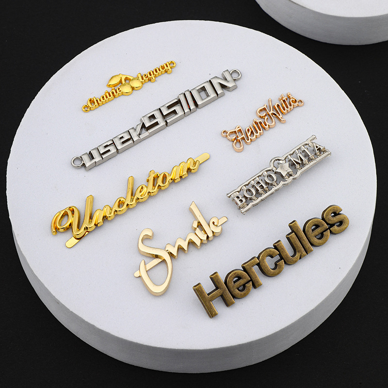 Customized Clothing Accessories Metal Pure Logo Hollow Letter Signs Electroplated Gold Sign Zinc Alloy Clothing Tag